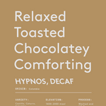 Hypnos decaf coffee packaging highlighting relaxed, toasted, chocolatey notes with origin Colombia and natural decaffeination process.
