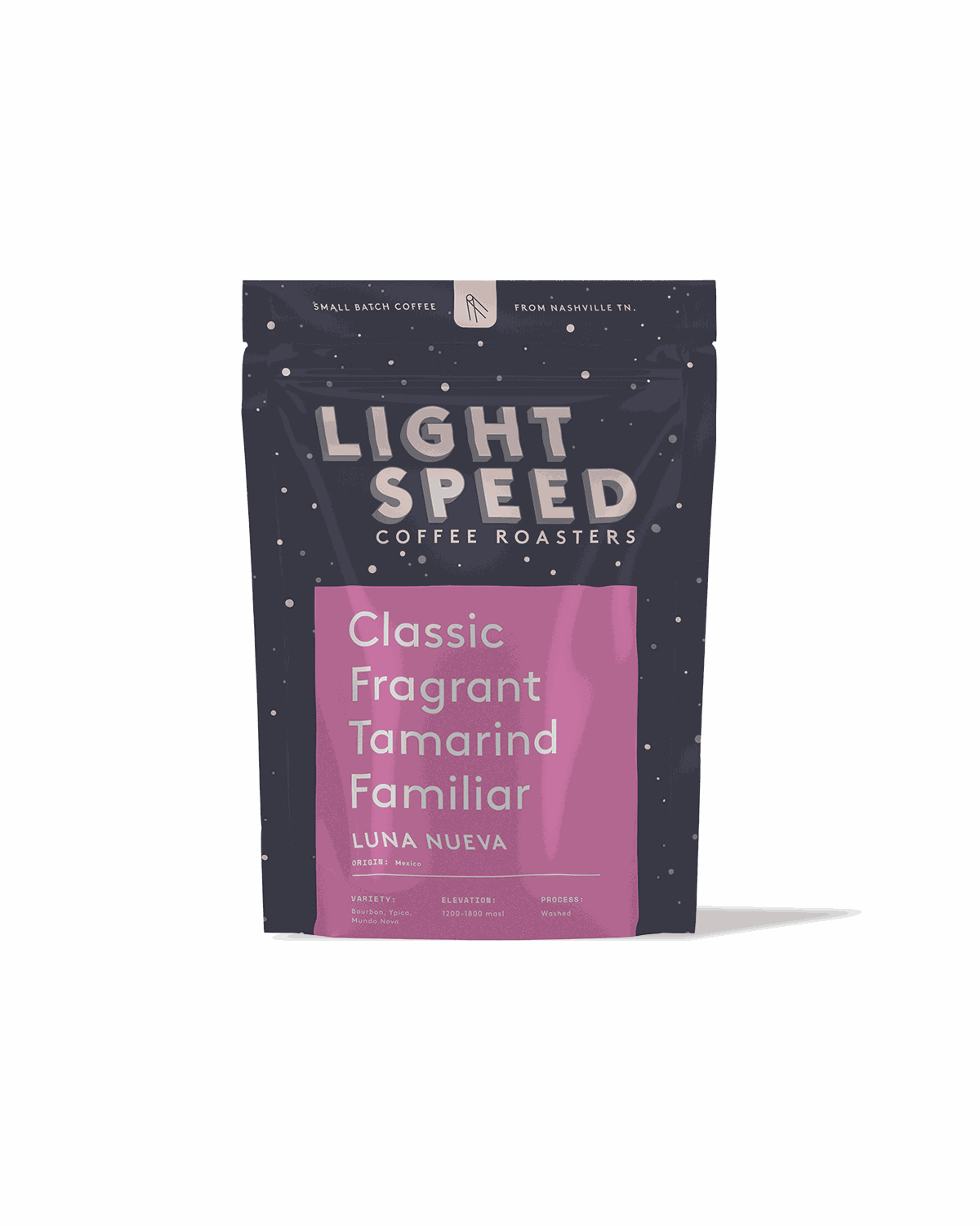 Luna Nueva specialty-grade Mexican coffee with nutty, cedar, clove, and tamarind flavors in a dark purple and pink Light Speed Coffee Roasters bag